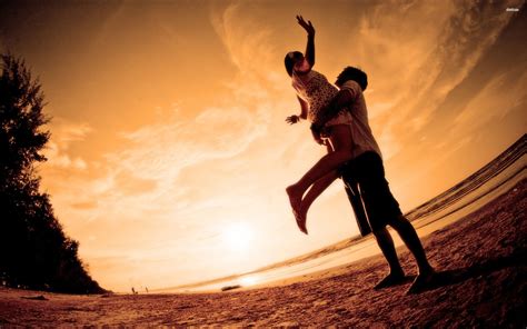 Romantic Couple At The Beach Wallpaper