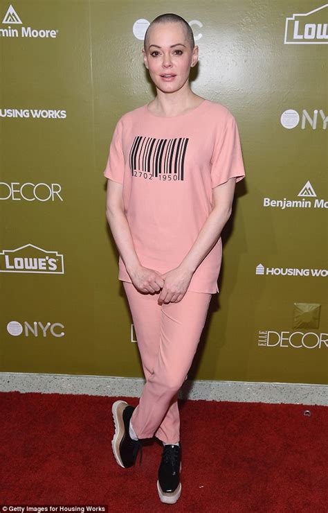 Rose McGowan shows off her style in pink barcode top at ...