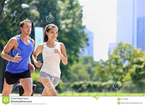 Runners Jogging In New York City Central Park, USA Stock ...