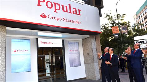 Santander acelera el saneamiento del Popular con una ...