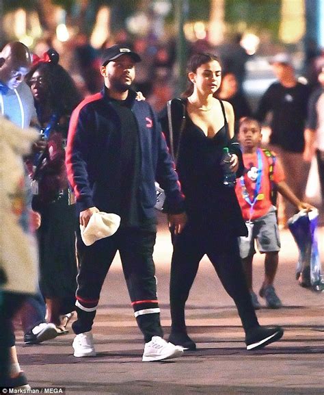 Selena Gomez looks loved up with The Weeknd at Disneyland ...