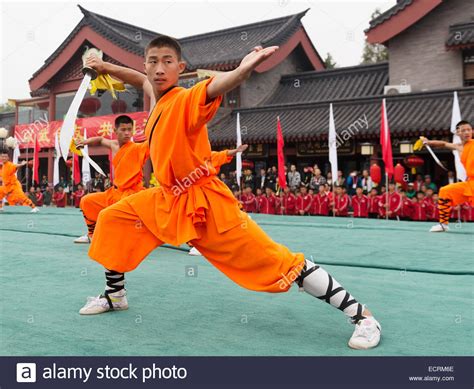 Shaolin Kung Fu student with a broad sword performing at ...