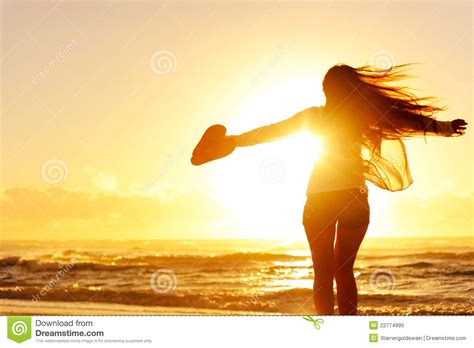 Silhouette Of A Woman Dancing By The Ocean Royalty Free ...