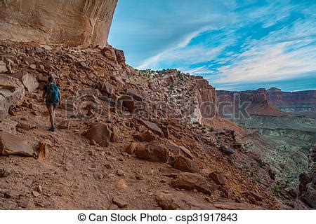 Stock Photo of Hiking Canyonlands Backpacker on the trail ...