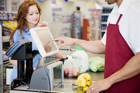 Supermarket: Cashier Ringing Up Purchase by Sean Locke ...