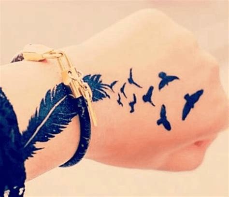 Tatuajes De Aves En La Mano   Ideas de tatuajes