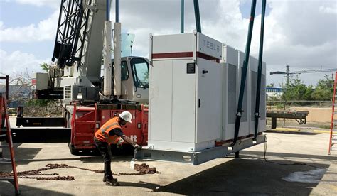Tesla posts first photos of solar+battery project in ...