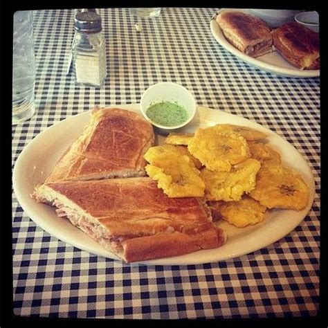The Cubano sandwich with tostones  fried plantains ...