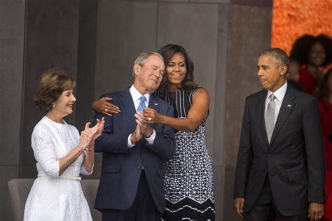 The Hug Felt Around The Country: Michelle Obama, George W ...
