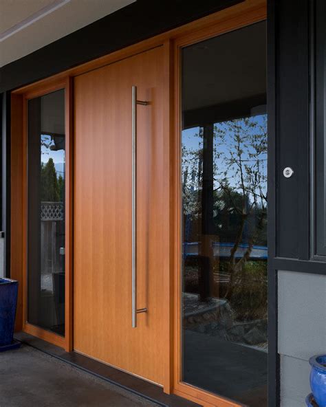 These 13 Sophisticated Modern Wood Door Designs Add A Warm ...