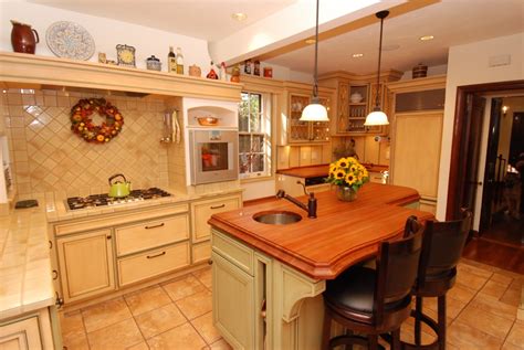 Warm Farmhouse Kitchen Cabinets by Graber