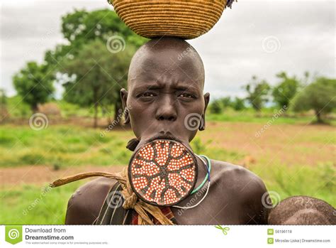 Woman From The African Tribe Mursi With A Big Lip Plate ...