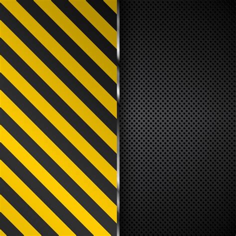 Yellow and black stripes on a perforated metal background ...