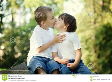 Young children kissing stock image. Image of kissing ...